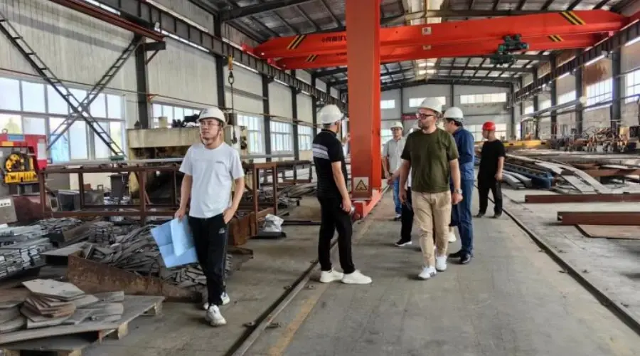 Deepening Our Overseas Presence: Algerian Client Visits Our Facility; Steel Structure Project Successfully Contracted and Shipped